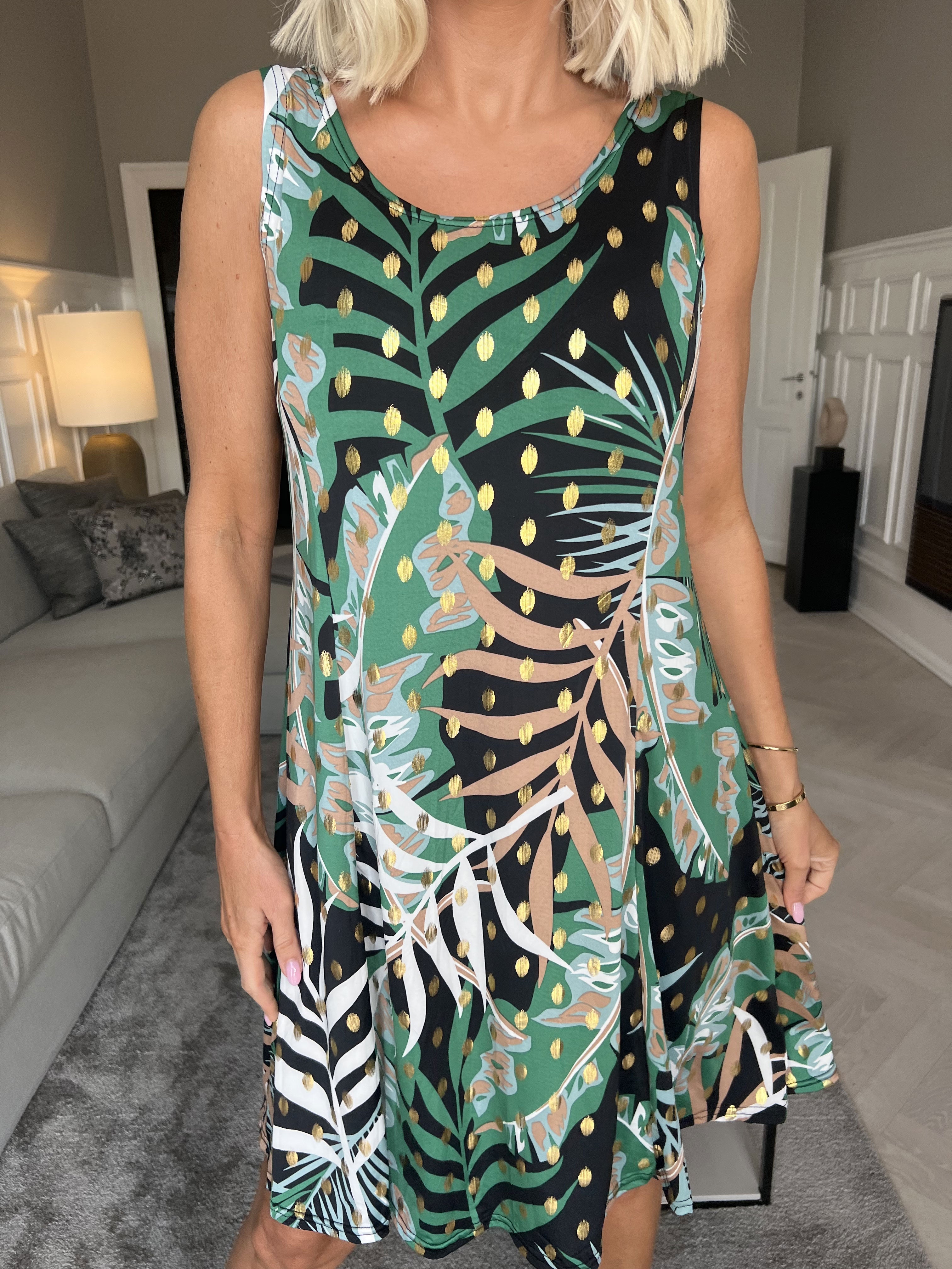 Maj - Söt stretchig sommarklänning med guldfläckar